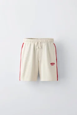 Niños ZARA 6 - 14 Años·Pantalones|6 - 14 Años·Deporte / Chándal<BERMUDA FELPA BANDAS