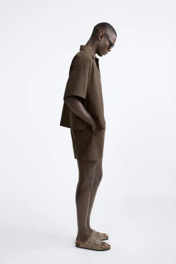 Online CAMISA TÉCNICA BOXY FIT Hombre Camisas