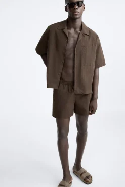 Online CAMISA TÉCNICA BOXY FIT Hombre Camisas