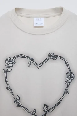 Niños ZARA 6 - 14 Años·Camisetas<CAMISETA CORAZÓN Y FLORES