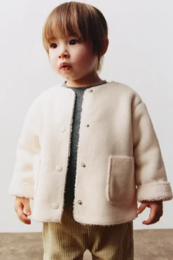 Niños ZARA 0 - 6 Meses·Sacos / Buzos|6 - 18 Meses·Abrigos / Buzos<CAZADORA DOBLE FAZ