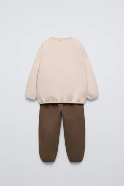 Niños ZARA 1½ - 6 Años·Sudaderas|1½ - 6 Años·Pantalones<CONJUNTO JOGGING SUDADERA Y JOGGER TEXTO RIZO