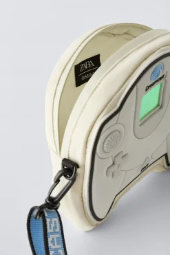 Niños ZARA 6 - 14 Años·Bolsos / Mochilas|6 - 14 Años·Bolsos / Mochilas<MINI BANDOLERA DREAMCAST @SEGA