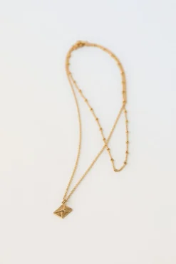 Niños ZARA 1½ - 6 Años·Accesorios|Accesorios / Zapatos / 0 - 14 Años<PACK DOS COLLARES BOLITAS Y CHARM SOBRE BAÑO ORO 24KT