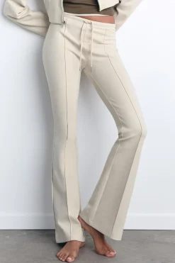 Hot PANTALÓN FLARE INTERLOCK COSTURAS Mujer Pantalones|Sudaderas / Joggers