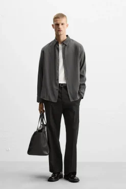 New PANTALÓN FLARED FIT Hombre Pantalones