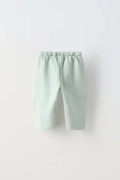 Niños ZARA 6 - 18 Meses·Pantalones / Leggings<PANTALÓN LISO BOLSILLOS