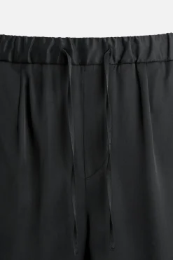 New PANTALÓN RELAXED FIT SATINADO Hombre Pantalones