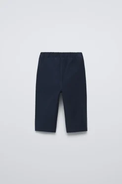 Niños ZARA 6 - 18 Meses·Pantalones / Leggings<PANTALÓN SARGA BOLSILLOS