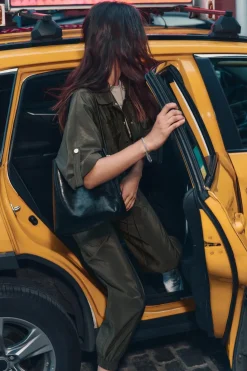 Sale PANTALÓN SATINADO BAJO PUÑO Mujer Pantalones