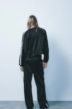 Outlet PANTALÓN SATINADO BANDA LATERAL Mujer Pantalones