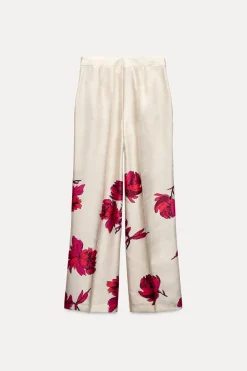 Online PANTALÓN SATINADO ESTAMPADO FLORAL Mujer Pantalones