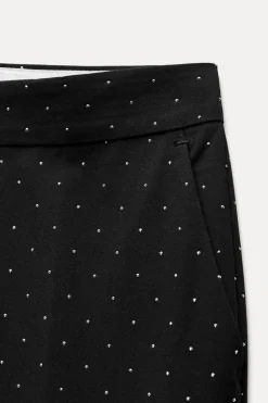 Discount PANTALÓN TOBILLERO BRILLOS Mujer Pantalones