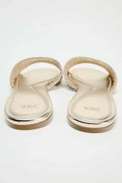 Online SANDALIA PLANA TRENZADA METALIZADA Mujer Zapatos