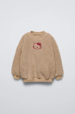 Niños ZARA 1½ - 6 Años·Sudaderas|1½ - 6 Años·Licencias<SUDADERA BORREGUILLO FORRADA HELLO KITTY © SANRIO