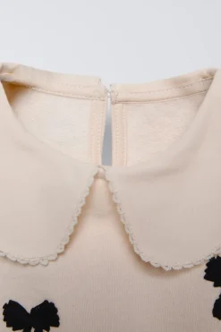 Niños ZARA 1½ - 6 Años·Sudaderas|6 - 18 Meses·Sudaderas<SUDADERA CUELLO APLIQUE LAZOS