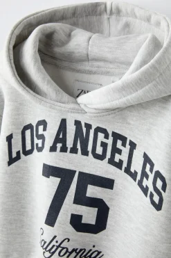 Niños ZARA 6 - 14 Años·Sudaderas|6 - 14 Años·Deporte / Jogging<SUDADERA TEXTO CROP FIT