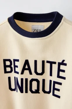 Niños ZARA 6 - 14 Años·Sudaderas<SUDADERA TEXTO FLOCK