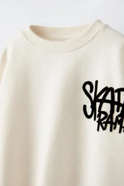 Niños ZARA 1½ - 6 Años·Sudaderas|6 - 18 Meses·Sudaderas<SUDADERA TEXTO FLOCK