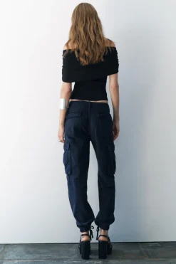 Outlet TOP PUNTO OFF SHOULDER ARANDELA METÁLICA Mujer Cárdigan / Jerséis|Punto